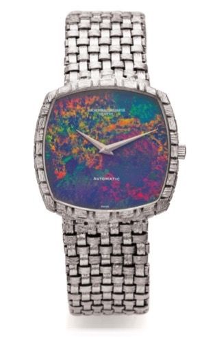VACHERON CONSTANTIN REF. 7391.OPAL DIAL AND WHITE GOLD.Vacheron Constantin, Genève, No. 656445.case No. 478429, Ref. 7391. Made in the 1970s..Fine and rare, square and thin, self winding.18K white gold wristwatch with opal dial and an.integrated 18K w