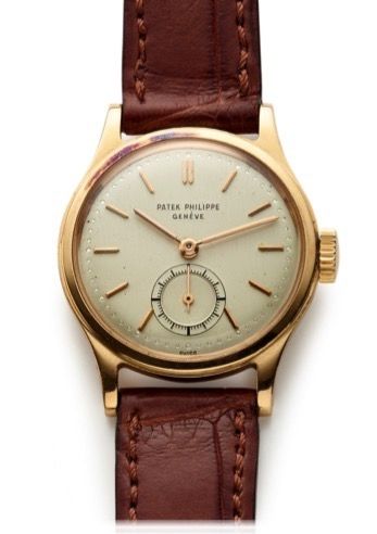 PATEK PHILIPPE REF. 2451 CALATRAVA.Patek Philippe, Geneve, No. 955094, case No. 658173, Ref. 2451..Made in the 1950s..Fine and rare, midsize, water-resistant, 18K yellow gold wristwatch.