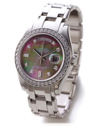 ROLEX REF. 18946 DAY DATE.DIAMOND AND PLATINUM.Rolex, Oyster Perpetual, Day Date, Superlative Chronometer Officially Certified, case No..K557793, Ref. 18946/2286. Made circa 2001. Very fine and rare, heavy, tonneau-shaped, water-.resistant, center seconds