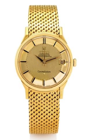 OMEGA REF. 168005.CONSTELLATION YELLOW GOLD.Omega, Automatic, Chronometer, Officially Certified.Constellation movement No. 23919565, case No..A02036, Ref. 168005/6. Made in the 1960s. Fine, center.seconds, self-winding, water resistant, 18K yellow gold.Ch