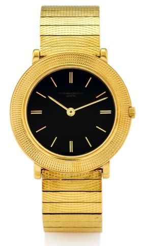 VACHERON CONSTANTIN REF. 6395.BLACK DIAL YELLOW GOLD.Vacheron Constantin, Genève, No. 544522, case.No. 370291, Ref. 6395. Made circa 1960..Fine and rare, small, extra-flat, water-resistant.18K yellow gold wristwatch with a detachable 18k.yellow gold b