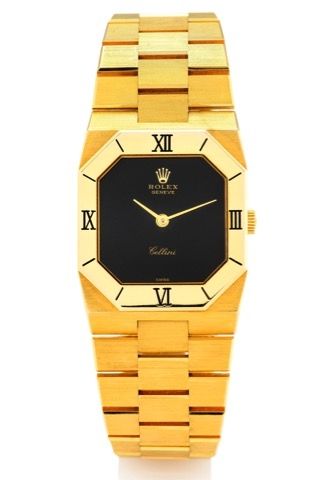 ROLEX REF. 4350 CELLINI YELLOW GOLD.Rolex, Genève, Cellini, case No. 4358925, Ref. 5019..Made in the 1977, sold on March 25th, 1985..Fine and very rare, elegant, heavy and octagonal 18K.yellow gold wristwatch with an integral 18K yellow gold.Rolex link br