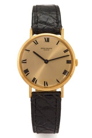 PATEK PHILIPPE REF. 3537 YELLOW GOLD.Patek Philippe, Genève, No. 1220427, case No..2733313, Ref. 3537. Made circa 1970..Fine, elegant, 18K yellow gold wristwatch with an.18K yellow gold Patek Philippe buckle..Dial, case and movement signed.