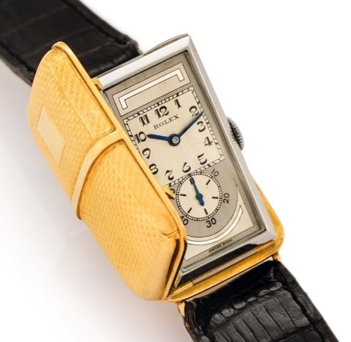 ROLEX REF. 1599, SPORTING.PRINCE CHRONOMETER YELLOW GOLD.Rolex, Sporting Prince Chronometer, Ref. 1883/1599. Produced.in 1932..Very fine and extremely rare, rectangular curved, 18K yellow.gold and stainless steel hunting-cased gentleman's wristwatch.