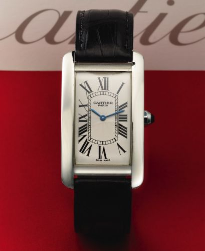 CARTIER REF. 1734 PLATINUM TANK.Cartier, Tank American, case No. GC 16782, Ref. 1734..Made in 2000, sold January 17th, 2001..Very fine and rare, rectangular curved, water-resistant, platinum.wristwatch with a stainless steel Cartier deployant clasp..Accom