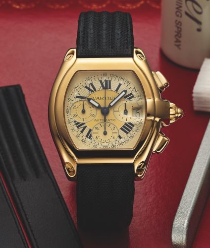 CARTIER REF. 2619 ROADSTER.AUTOMATIC CHRONOGRAPH YELLOW GOLD.Cartier, Roadster Chronograph, Automatic, case No. 108851 LX.Ref. 2619. Sold October 3rd, 2000..Fine, large, tonneau-shaped, curved, self-winding, water resistant to.100 m, 18K yellow gold wrist
