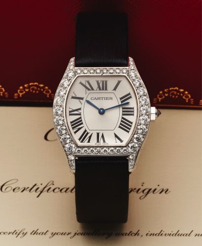 CARTIER TORTUE REF. 2644 WHITE GOLD.DIAMONDS.Cartier Tortue, Private Collection, No. 92066 LX, Ref. 2644. Sold October 2011..Fine, tonneau-shaped, water-resistant, 18K white gold and diamonds wristwatch with.an 18K white gold Cartier deployant clasp. Acco