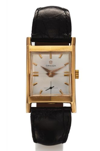 OMEGA REF. 3946 PINK GOLD.Omega, No. 13182519, case No. 11277969.Ref. 3946. Made circa 1955..Very fine, rectangular curved and faceted.18K pink gold wristwatch..Dial, case and movement signed.