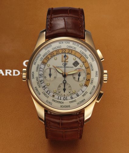GIRARD-PERREGAUX REF. 49805.WORLD TIME CHRONOGRAPH PINK GOLD.Girard-Perregaux, World Time Chronograph, No. 261.Ref. 49805. Made circa 2008..Very fine, large, world time, self-winding, water-resistant, 18K pink.gold wristwatch with square button chronograp
