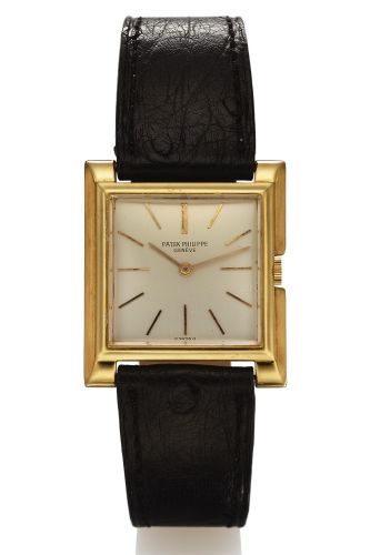 PATEK PHILIPPE REF. 2562 YELLOW GOLD.Patek Philippe Cie, Genève, No. 855696, case No. 689874.Ref. 2562. Made circa 1955..Very fine and unusual, square, 18K yellow gold wristwatch with an.18K yellow gold Patek Philippe buckle.