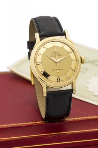 OMEGA REF. 2782 CONSTELLATION AUTOMATIC, GOLD Omega, Automatic, Chronometer, Officially Certified Constellation, movement No. 13963536, Ref. 2782/2799 SC. Sold in August 1955. Fine, center seconds, self-winding, 18k yellow gold wristwatch. Accompanied by 