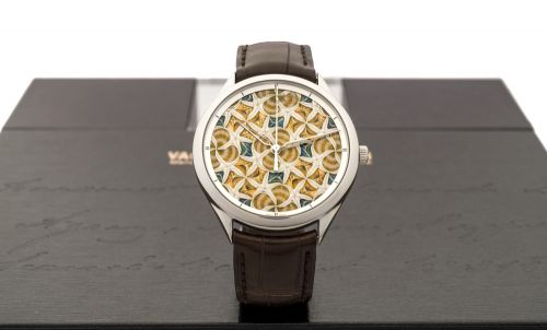 VACHERON CONSTANTIN, METIERS D'ART, FLOWERS Vacheron Constantin, Genève, "Métiers d'Art Les Univers Infinis". No. 05/20, case No. 1226915, Ref. 86222. Very fine and rare, center seconds, self-winding, water-resistant, 18K white gold wristwatch with enamel