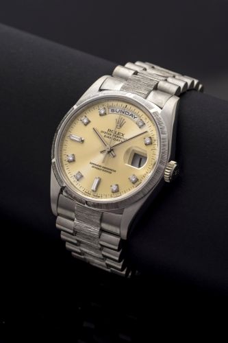 ROLEX REF 18249, DAY-DATE, BARK FINISH WHITE GOLD AND DIAMOND INDEXES Rolex, "Oyster Perpetual "Day-Date" Superlative Chronometer Officially Certified", case No. A572351 Ref. 18296. Made circa 1999. Very fine and extremely rare, center seconds, self- wind