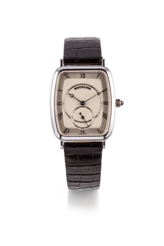 BREGUET, REF. 3490, WHITE GOLD Breguet, case No. 3922G, Ref. 3490 Made circa 1990. Fine, manual wind 18k white gold wristwatch. Montre bracelet en or blanc. Boitier tonneau. Couronne de remontoir sertie d'un cabochon. Cadran argent avec index romains pein