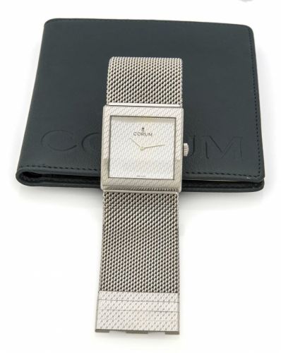 CORUM BUCKINGHAM REF. 157.171.20 STEEL A fine and unusual manual-winding stainless steel wristwatch.