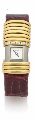 CARTIER DECLARATION LADY'S REF. 2611 QUARTZ TITANIUM ROSE GOLD ANDDIAMONDS A very fine and unusual quartz 18K rose gold and titanium lady's diamond-set wristwatch.