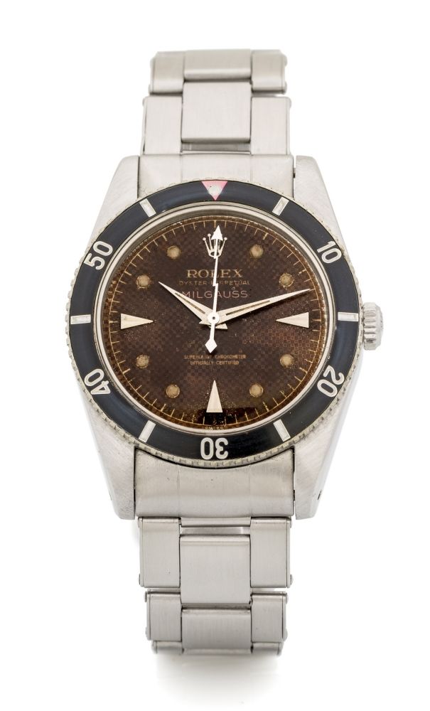 ROLEX REF. 6541 MILGAUSS REF. 6541 TROPICAL BROWN Very fine and extremely rare, antimagnetic, water-resistant, self-winding,lightning bolt center seconds hand.