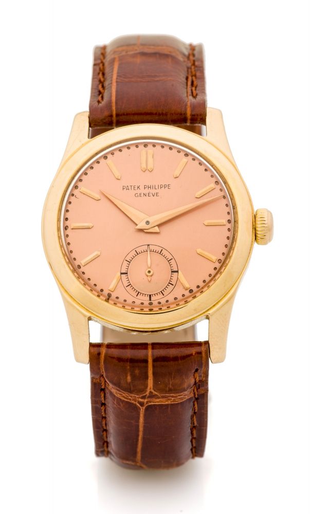 PATEK, REF. 2483, PINK ON PINK A fine and rare manual wind pink gold waterproof wristwatch with pink dial.