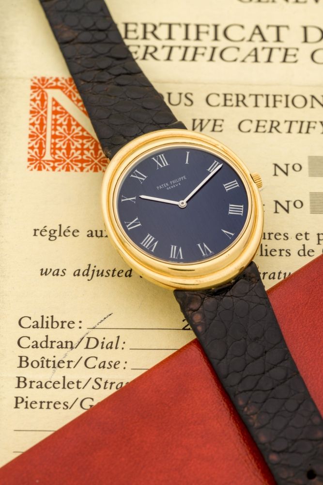 PATEK PHILIPPE, REF. 3594, YELLOW GOLD A fine, self-winding, 18k yellow gold wristwatch.