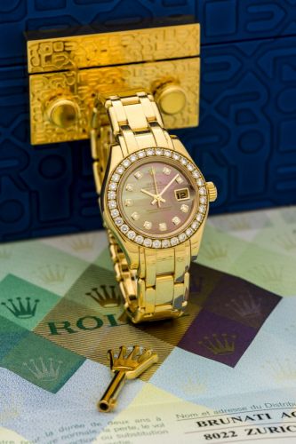 ROLEX, PEARLMASTER DATEJUST, REF. 80298, MOTHER OF PEARL AND DIAMONDS A fine, self-winding, 18k yellow gold and diamond wristwatch with mother-of-pearl dial.