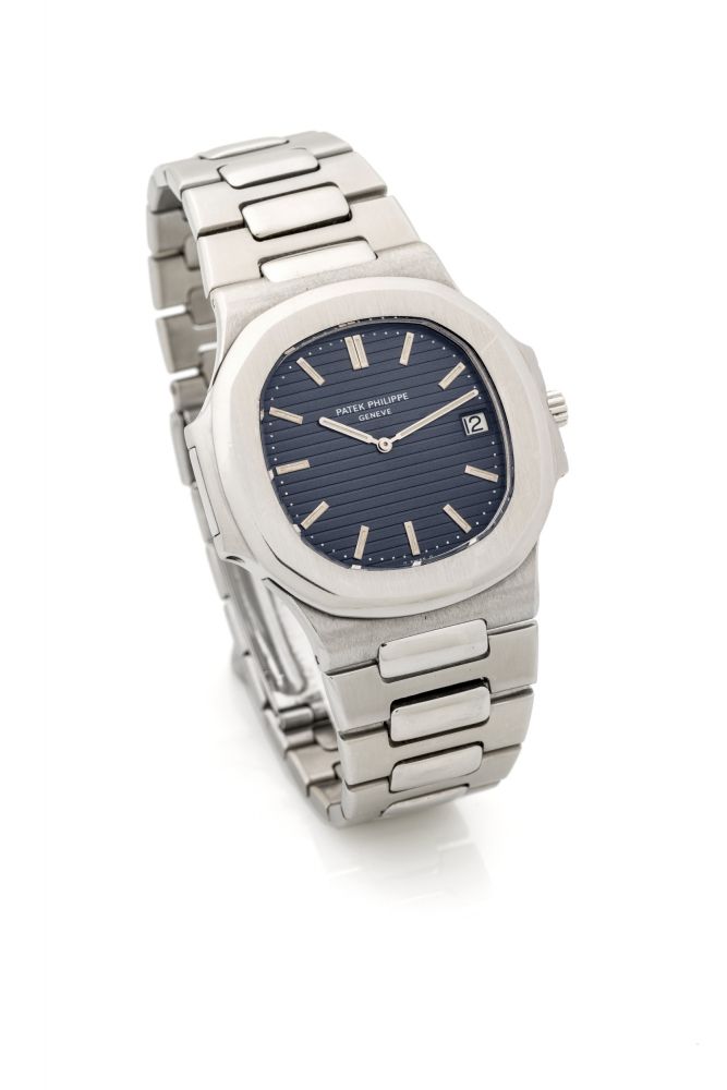 PATEK PHILIPPE NAUTILUS JUMBO A fine, self winding, stainless steel wristwatch with blue dial and date.