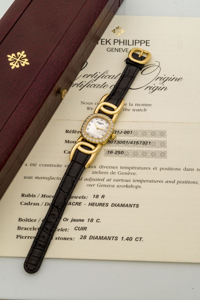PATEK PHILIPPE, ELLIPSE, REF. 4931, MOTHER OF PEARL AND DIAMONDS A fine, manual wind, 18k yellow gold wristwatch with mother-of-pearl dial and diamond bezel.