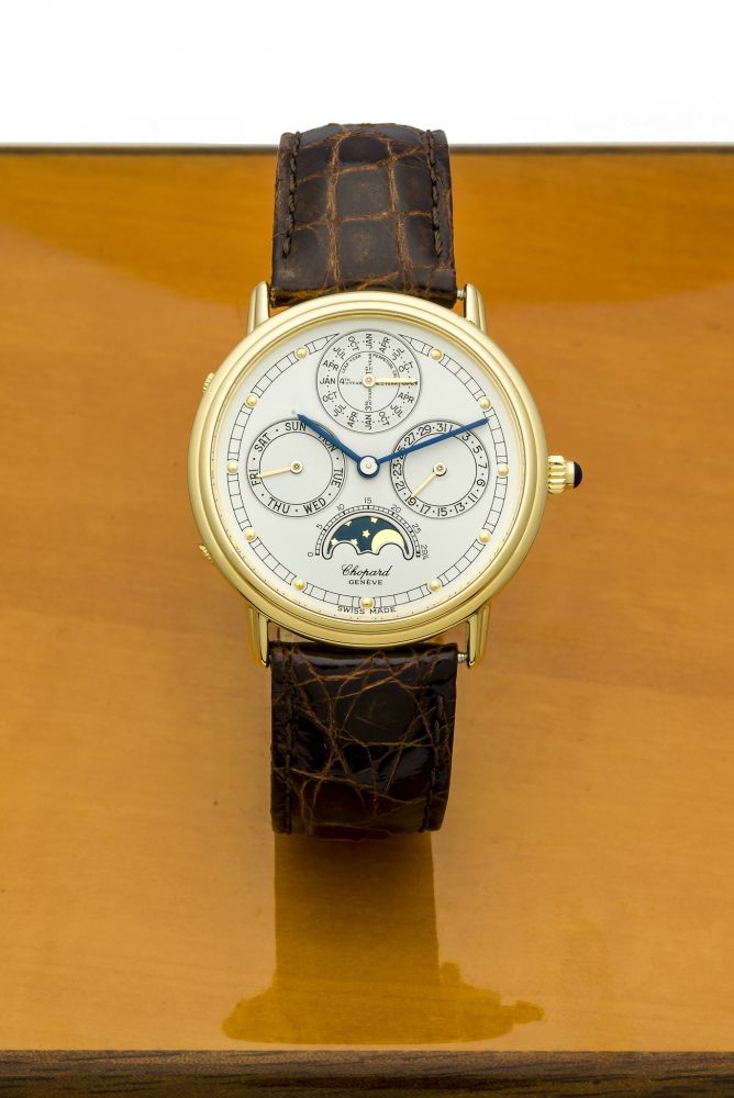 CHOPARD LUNA D'ORO REF. 36-1104 YELLOW GOLD Fine and rare, self-winding, 18K yellow gold wristwatch with perpetual calendar and moon phases.