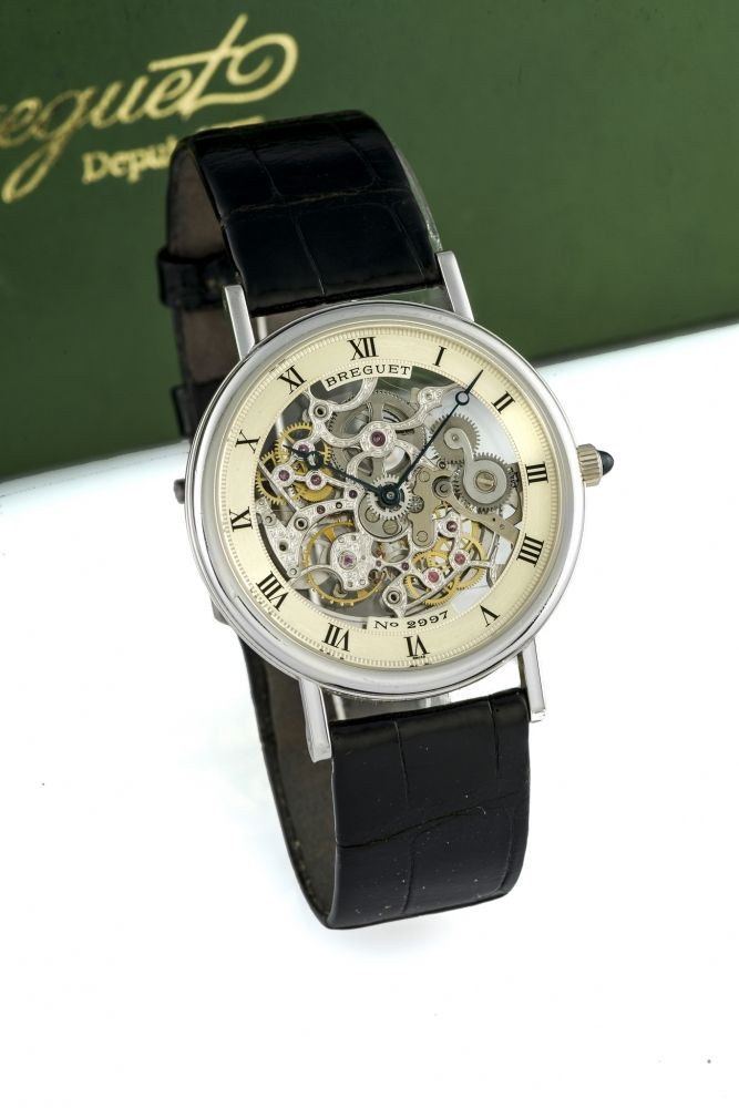 BREGUET REF. 3030 SKELETON WHITE GOLD Very fine and rare, self-winding, 18K white gold wristwatch with hand-engraving skeletonized movement.
