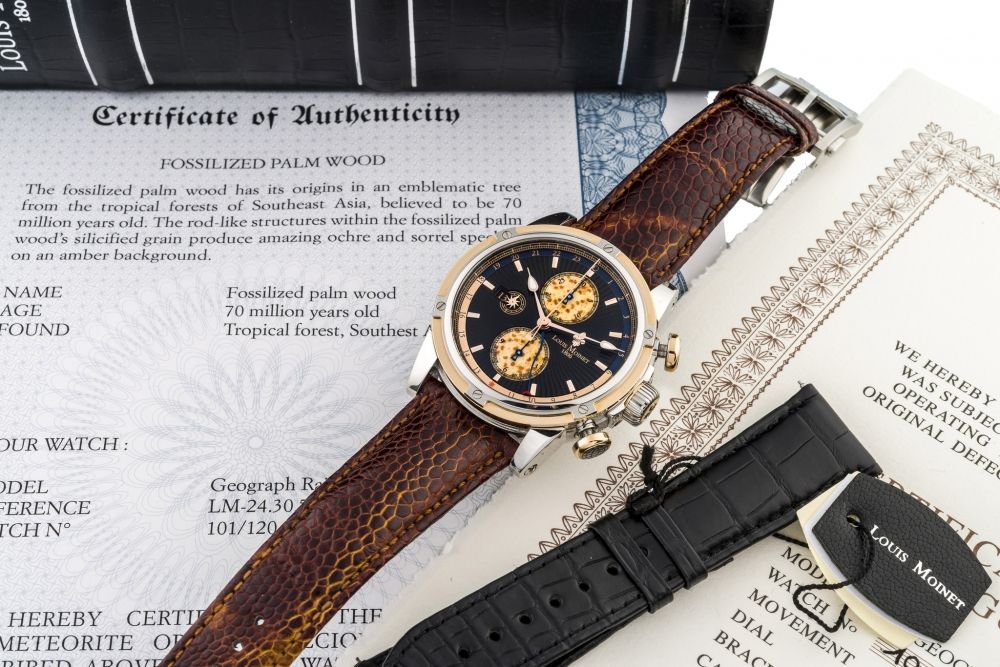 LOUIS MOINET, GEOGRAPH RAINFOREST, No. 101/120 A fine and limited, self-winding, stainless steel and pink gold, dual-time chronograph wristwatch with fossilized palm wood sub-dials.