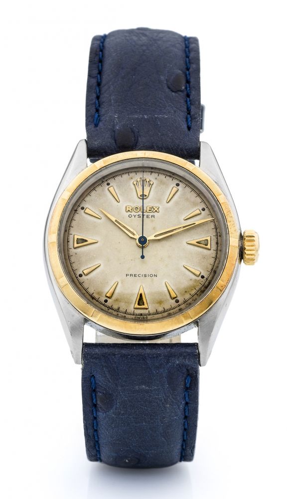ROLEX, REF. 6022 A fine, manual wind, steel and gold wristwatch.