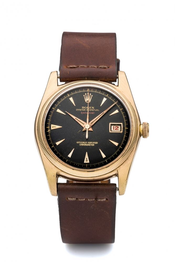 ROLEX, REF. 4467, RED DATEJUST, BLACK DIAL A very fine and rare, self-winding 18k pink gold with black dial.