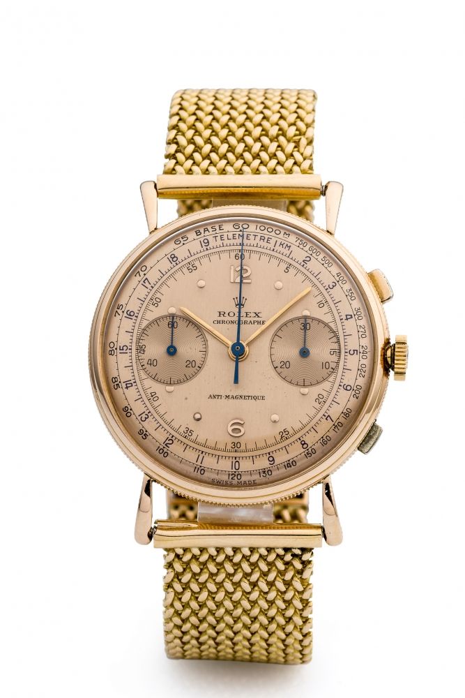 ROLEX, REF. 4062, COIN EDGE, PINK DIAL, PINK GOLD A fine and very rare, manual wind, 18k pink gold chronograph.