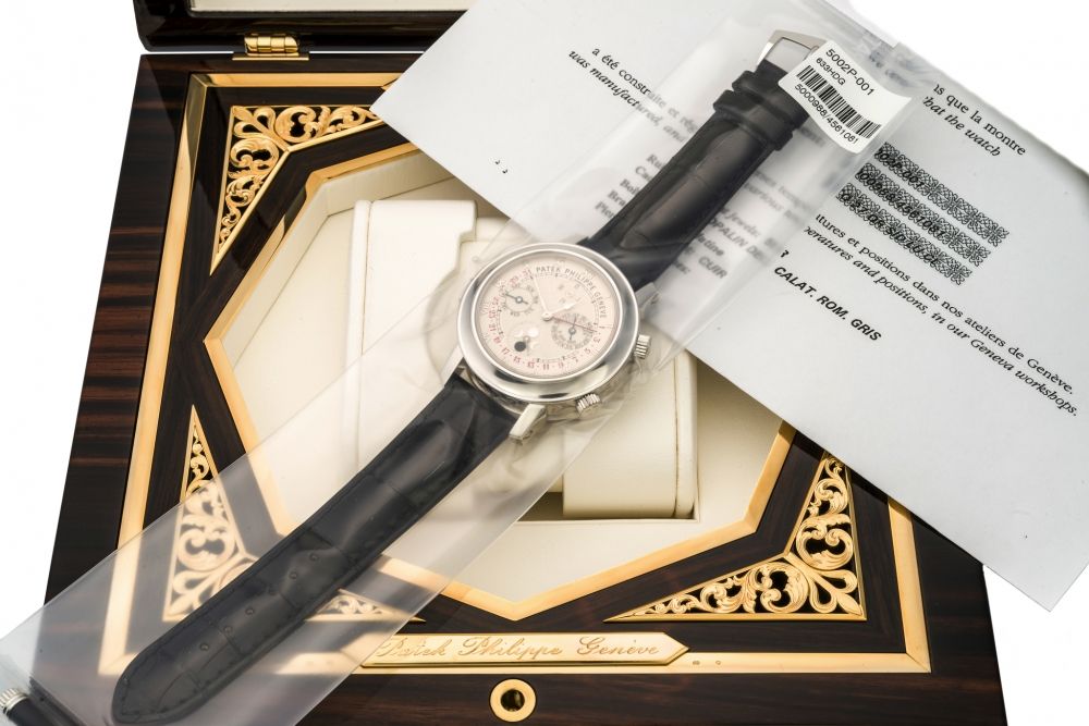 PATEK PHILIPPE, REF 5002, SKYMOON TOURBILLON A fine and extraordinary, manual wind, perpetual calendar, minute repeater tourbillon, platinum wristwatch with sky chart.