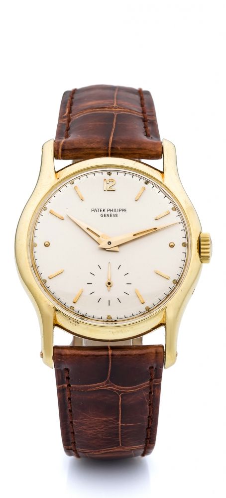 PATEK, REF. 2406, ELONGATED LUGS A fine, manual wind, 18k yellow gold wristwatch.