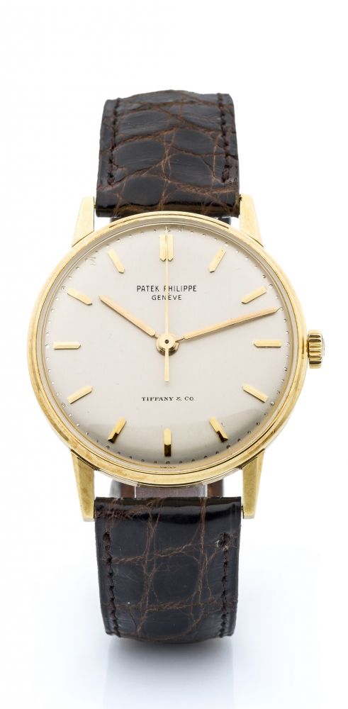 PATEK PHILIPPE, REF. 3411, RETAILED BY TIFFANY A fine, manual wind, center-seconds wristwatch.
