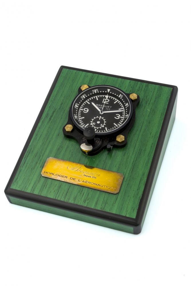 BREGUET TYPE 11 Fine and rare black painted airplane dashboard clock with chronograph.