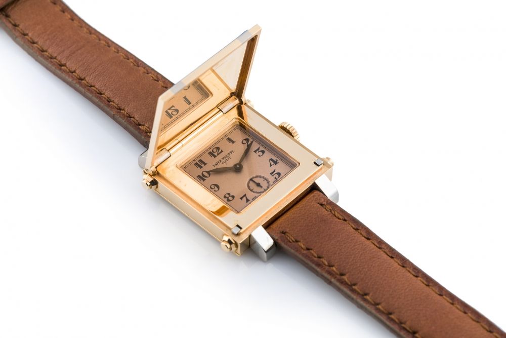 PATEK PHILIPPE, REF. 5099, GONDOLO CABRIOLET, NEW OLD STOCK A fine and unusual, manual wind, 18k white gold and pink gold cabriolet wristwatch.