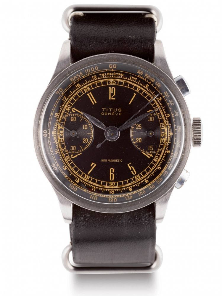 TITUS NON-MAGNETIC CHRONOGRAPH, BLACK DIAL Fine, nonmagnetic, stainless steel wristwatch with a square button chronograph, tachometer, telemeter and register. Jolie montre-bracelet en acier chronographe a poussoirs carres, avec échelle télémétrique et tac