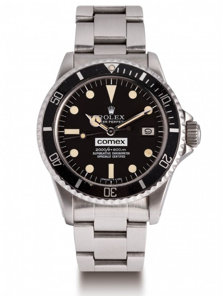 ROLEX-REF. 1665, SEA-DWELLER COMEX OF YVES GIRAN, DOCTOR ON THE HYDRA IV EXPERIMENT A fine and extremely rare, self-winding, stainless steel divers wristwatch. Très rare montre de plongée avec date ayant appartenu au docteur Yvan Giran en acier. Bo îtier 