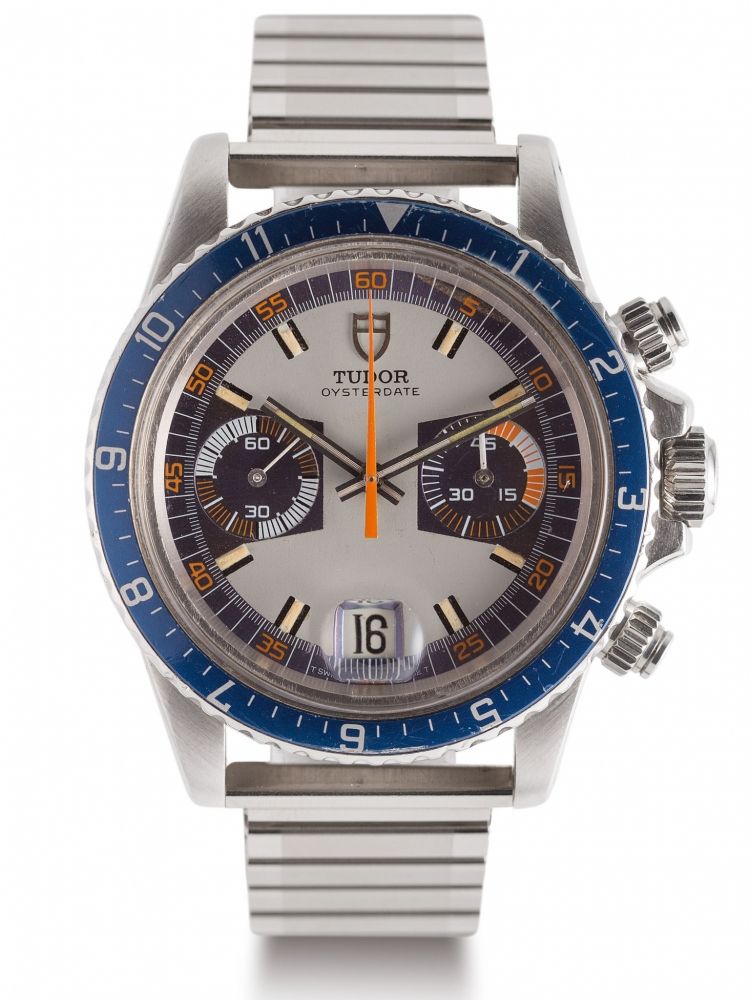 TUDOR REF. 7169, BLUE MONTE-CARLO A fine, manual wind, stainless steel chronograph wristwatch with date. Rare et beau chronographe braceleten acier. Bo îtier rond. Couronne, poussoirs et fond vissés. Lunettebleu tournante graduée. Cadran 3 tons gris, bleu