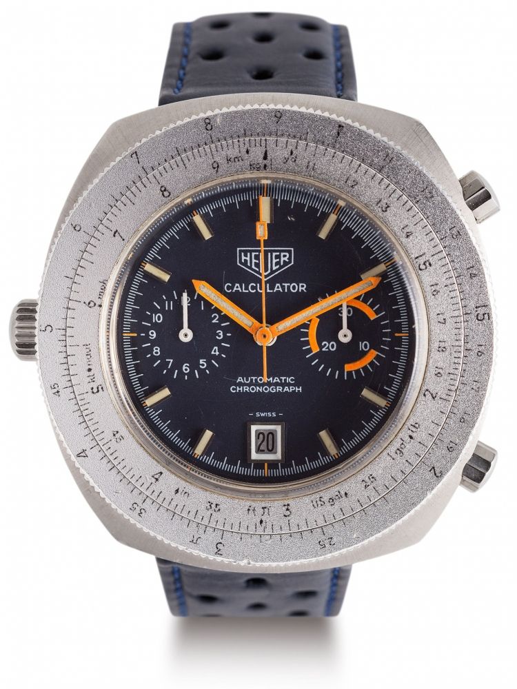 HEUER CALCULATOR REF. 110 633 CHRONOGRAPH STEEL Fine and rare, self-winding, stainless steel wristwatch with chronograph and date. Grand chronographe bracelet de piloteen acier. Bo îtier rond. Double lunette avec règle à calcul. Cadran bleu nuit avec deux