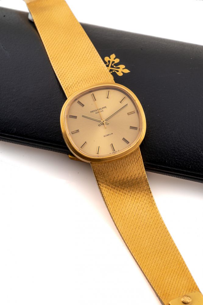 PATEK PHILIPPE, REF. 3586, RETAILED BY GUBELIN, YELLOW GOLD