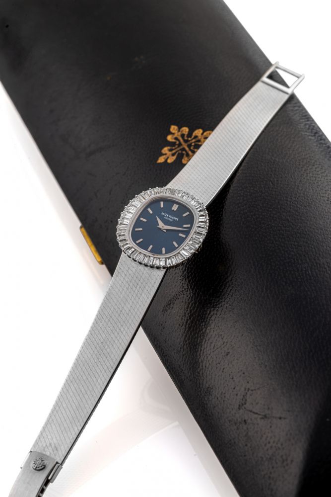 PATEK PHILIPPE, REF. 4138, BAGUETTE BEZEL, WHITE GOLD