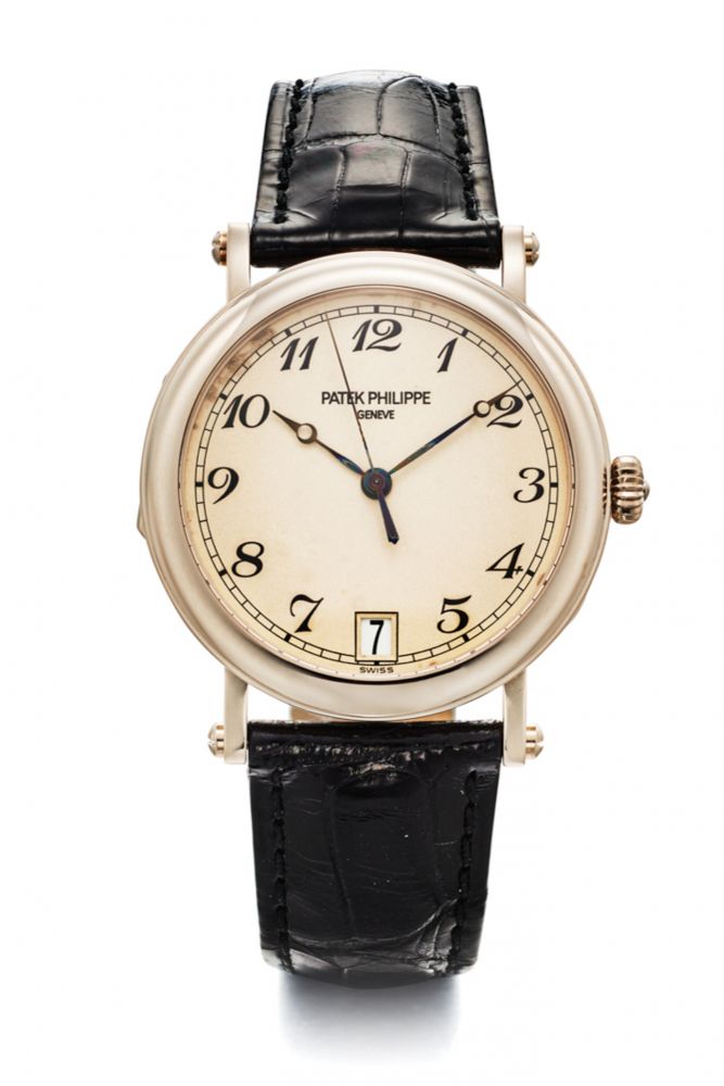 PATEK PHILIPPE REF. 5053 G, SELF-WINDING, “OFFICIER”-TYPE, CENTRE-SECONDS, DATE. 18K WHITE GOLD