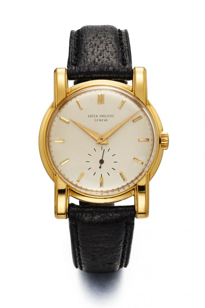 PATEK PHILIPPE REF. 2428, OVERHANGING FLUTED ELONGATED STRAIGHT LUGS. 18K YELLOW GOLD