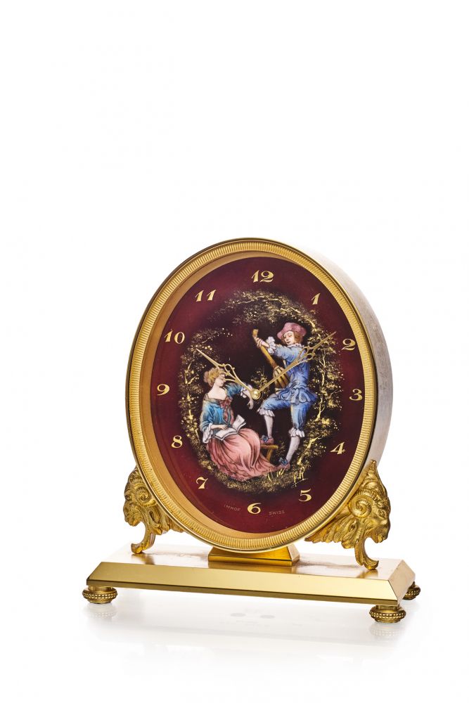 IMHOF 8-DAY TABLE CLOCK WITH LIMOGES-STYLE PAINTED ENAMEL DIAL. GILDED BRASS AND ENAMEL