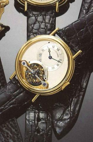 Breguet Tourbillon, No. 4765, Brevet du.7 Messidor, An 9, present series..Very fine, 18ct gold gentleman's wristwatch, with visible.tourbillon, fitted box and certificate.