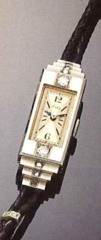 Rolex, Princess Egyptienne, Ref. 1466, 1930's..Fine and rare, rectangular, 18ct white gold and diamonds.lady's wristwatch, with cord bracelet.