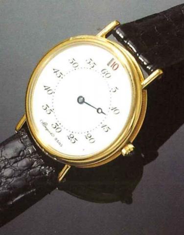 Breguet No 1, limited series of only 400 pieces to.be produced in platinum and 800 in yellow gold.Ref. 2505, made in 1991..Extremely fine and rare jumping-hour 18ct gold.gentleman's wristwatch.