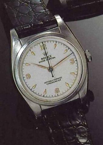 Rolex,Oyster P e r p e t u a l, O f f i c i a l l y.Certified Chronometer, Ref. 6050, 1940's..Fine tonneau shaped, center second, selfwinding.stainless steel, gentleman's wristwatch.